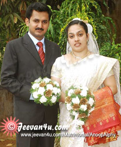 Anoop Alphy Wedding Photo at St Augustine Forane Church Ramapuram